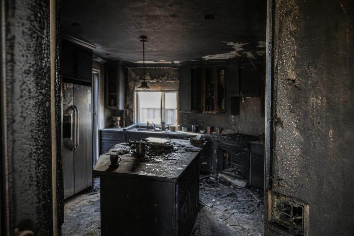 signs of smoke damage in a Lewisville home kitchen after a fire