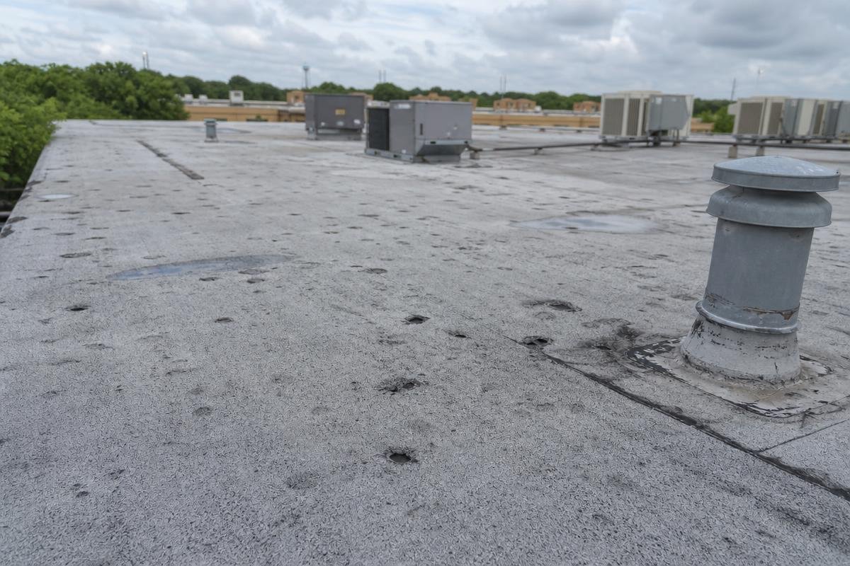 hail damage commercial roof Lewisville, TX after DFW storm