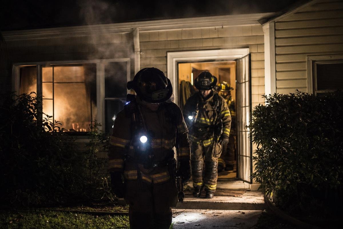 Firefighters responding to a house fire in Lewisville, TX